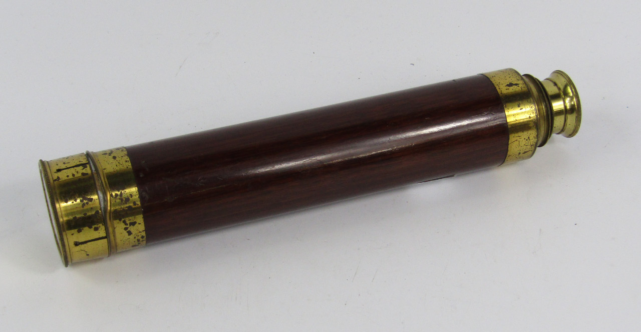 Appraisal: A mahogany bound brass three draw telescope cm long