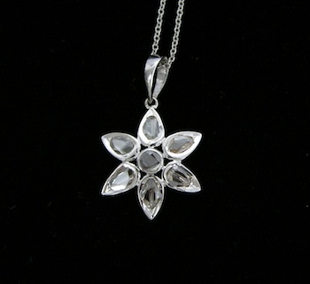 Appraisal: An k Flowerhead Pendant with Rose Cut Diamonds K white