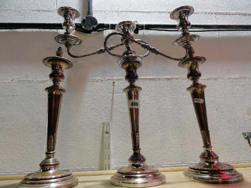 Appraisal: A silver plated two branch candelabra with reeded finish and