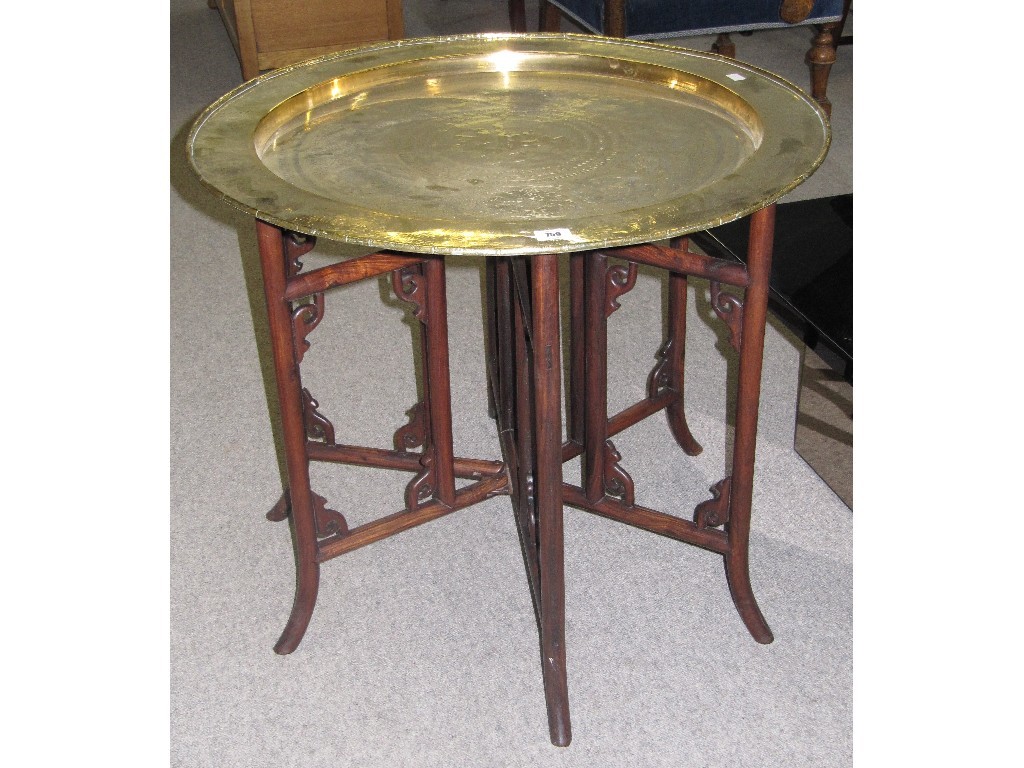 Appraisal: Oriental brass topped folding table