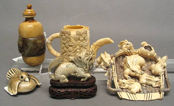 Appraisal: A group of Chinese and Japanese style miniature ivory carvings