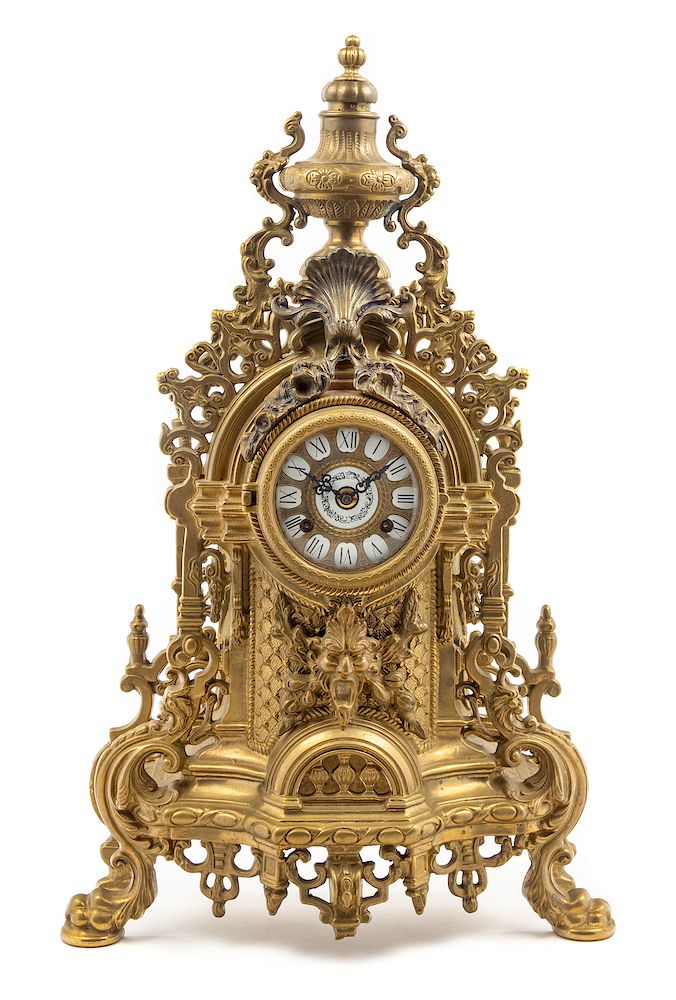 Appraisal: A Continental Neoclassical Brass Mantel Clock