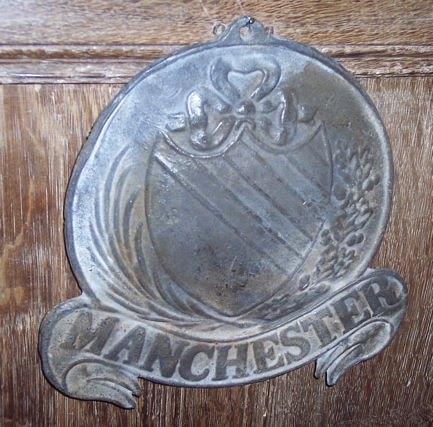 Appraisal: A lead insurance plaque Manchester cm wide