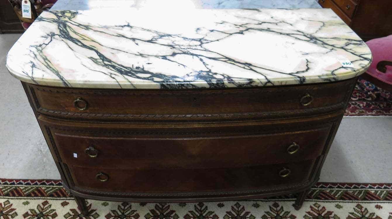 Appraisal: LOUIS XVI STYLE MARBLE-TOP CHEST American c s the bow