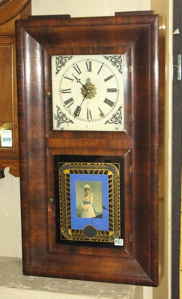 Appraisal: ROSEWOOD CASED OGEE WALL CLOCK Waterbury Clock Co late th