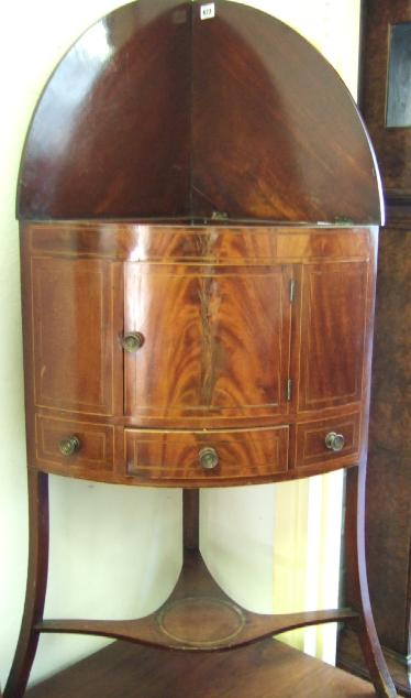 Appraisal: A Regency mahogany corner washstand with splash back boxwood and