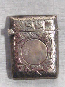 Appraisal: A silver vesta case with engraved decoration hallmarked Birmingham cm