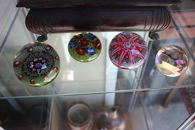 Appraisal: THREE OLD GLASS PAPERWEIGHTS with cane decoration possibly French and