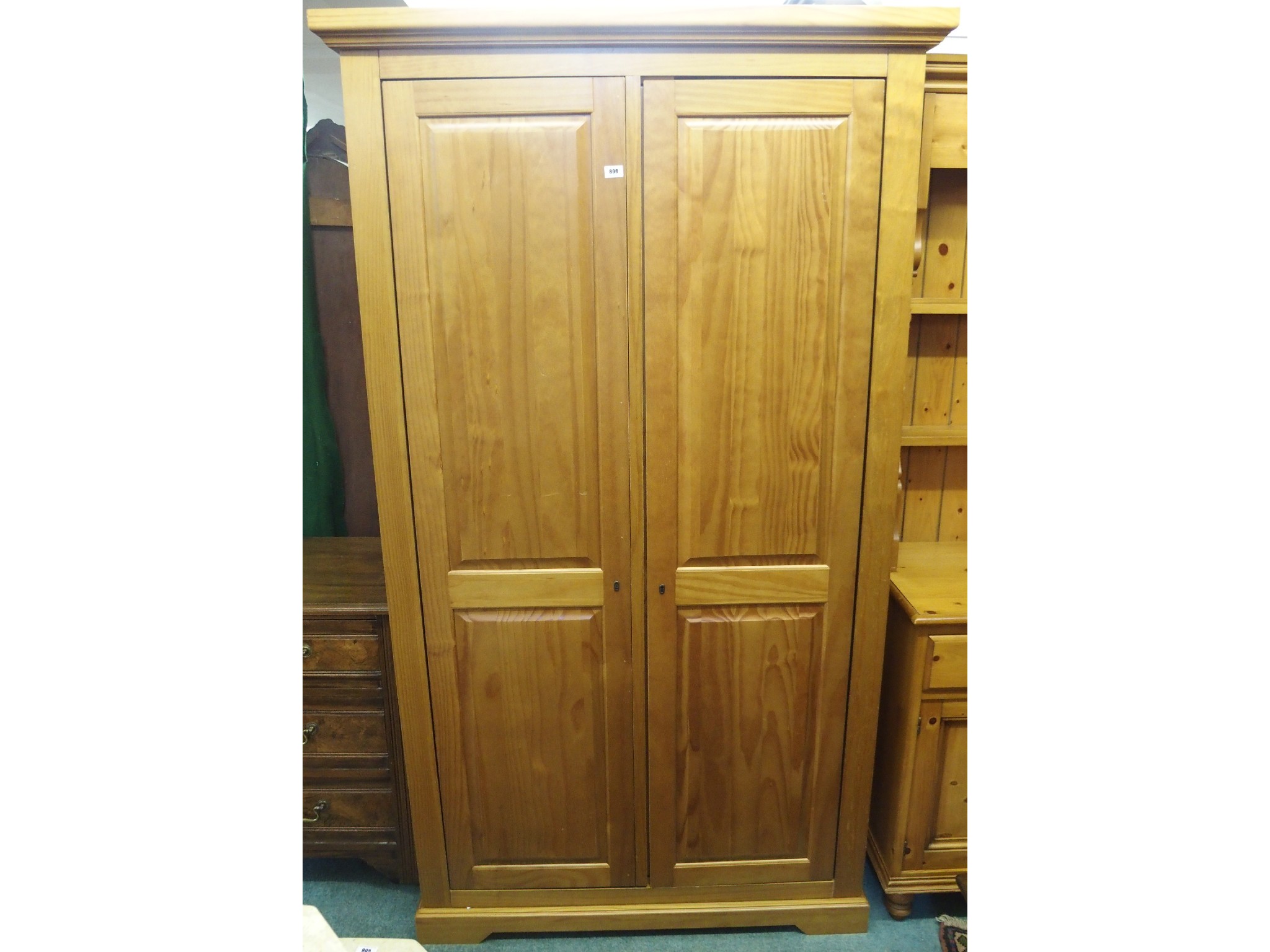 Appraisal: A contemporary two door pine wardrobe x x cm