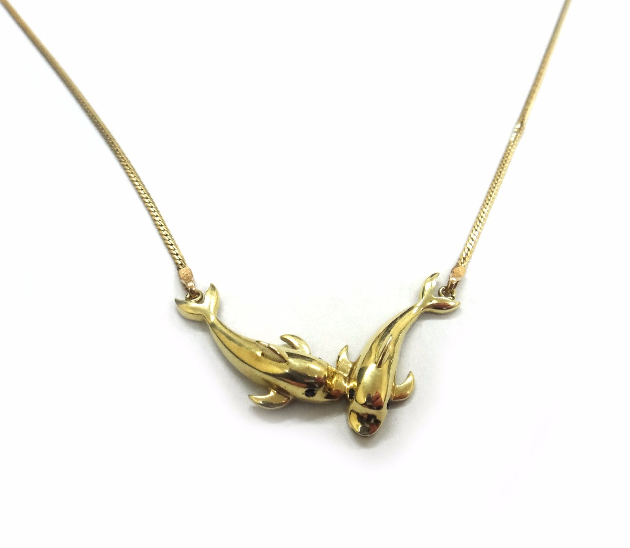 Appraisal: A Continental yellow metal necklace the front designed as two