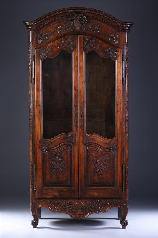 Appraisal: LOUIS XV CARVED FRUITWOOD ARMOIRE th century With glazed panel