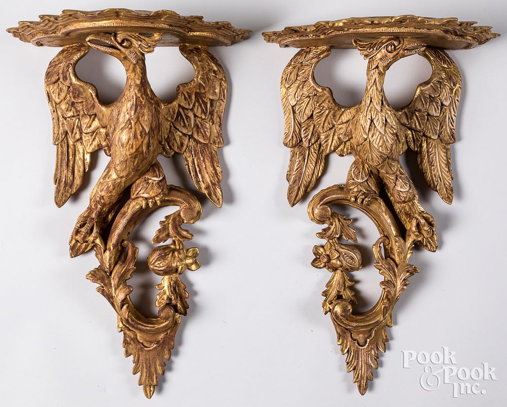 Appraisal: Pair of contemporary resin eagle wall shelves Pair of contemporary