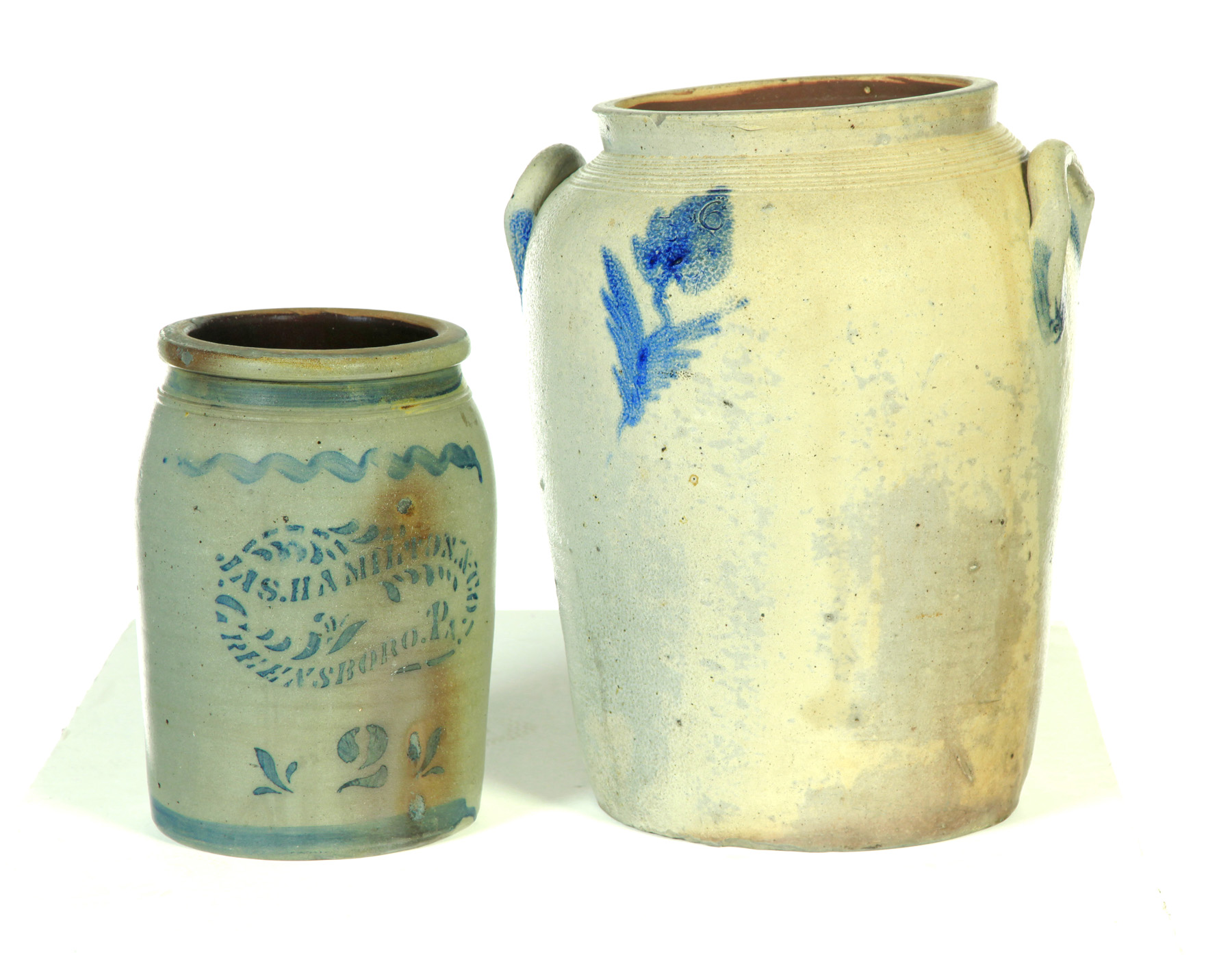 Appraisal: TWO STONEWARE JARS American nd half- th century Cobalt decoration