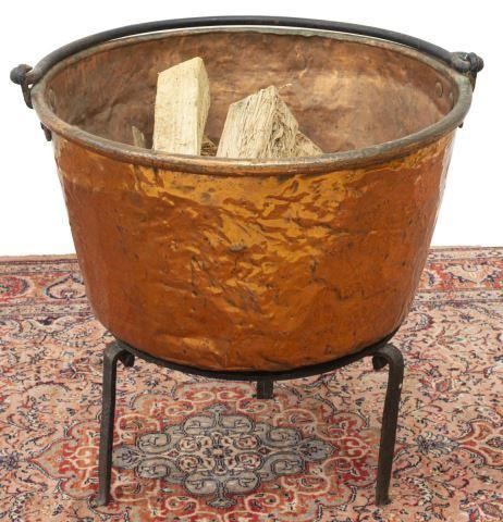 Appraisal: lot Hammered copper cauldron th c having single iron handle