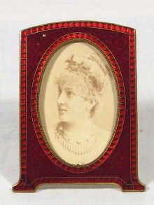 Appraisal: A gilt metal and red enamel picture frame measuring cm