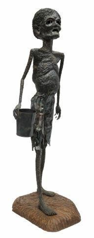 Appraisal: Iron sculpture African Child an evocative social commentary sculpture of