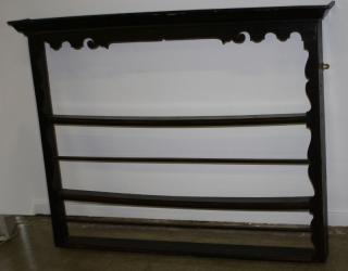 Appraisal: Early English hanging plate rack oak and soft wood scalloped