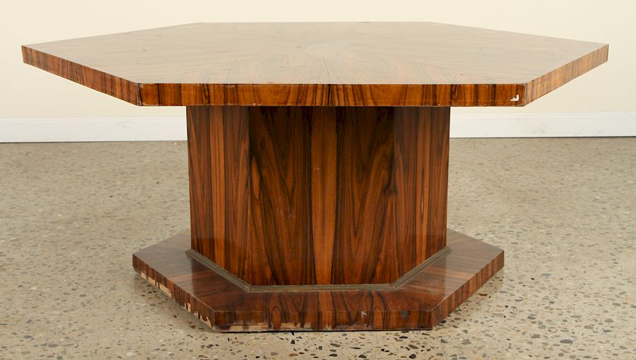 Appraisal: A HEXAGONAL ROSEWOOD COFFEE TABLE CIRCA A hexagonal rosewood coffee