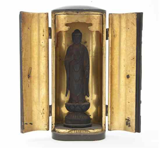 Appraisal: A Japanese Carved Wood Figure of Buddha in a small