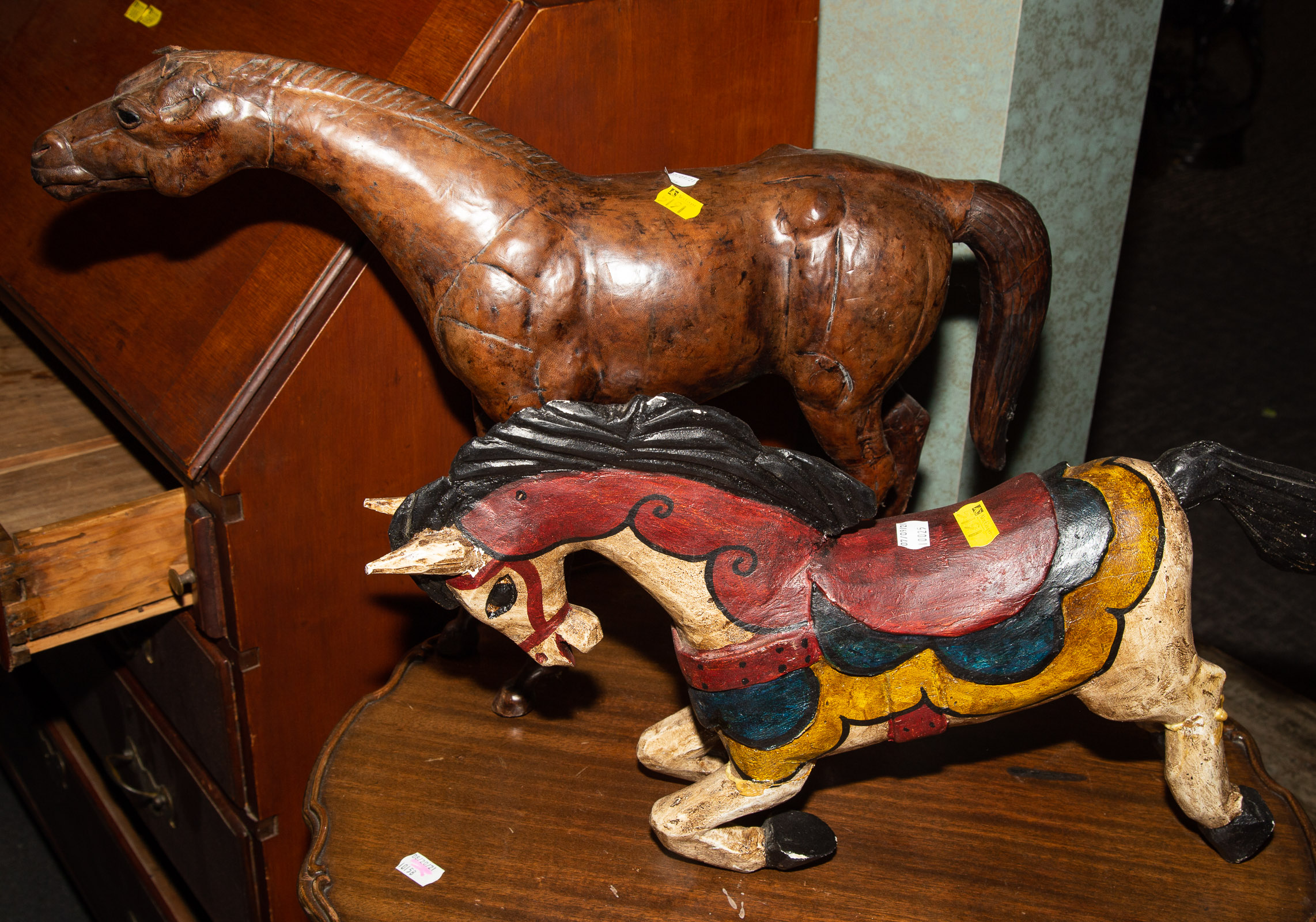 Appraisal: TWO HORSE FIGURES Includes painted folk art wood horse in