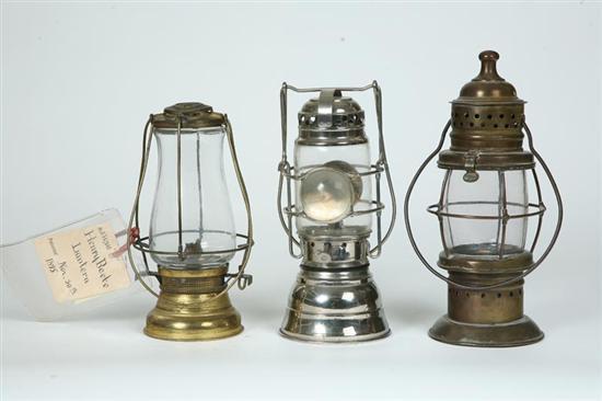 Appraisal: THREE OIL LAMPS Brass Henry Beebe patented lantern with papers