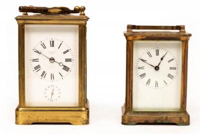 Appraisal: A gilt brass cased carriage clock the white enamel dial