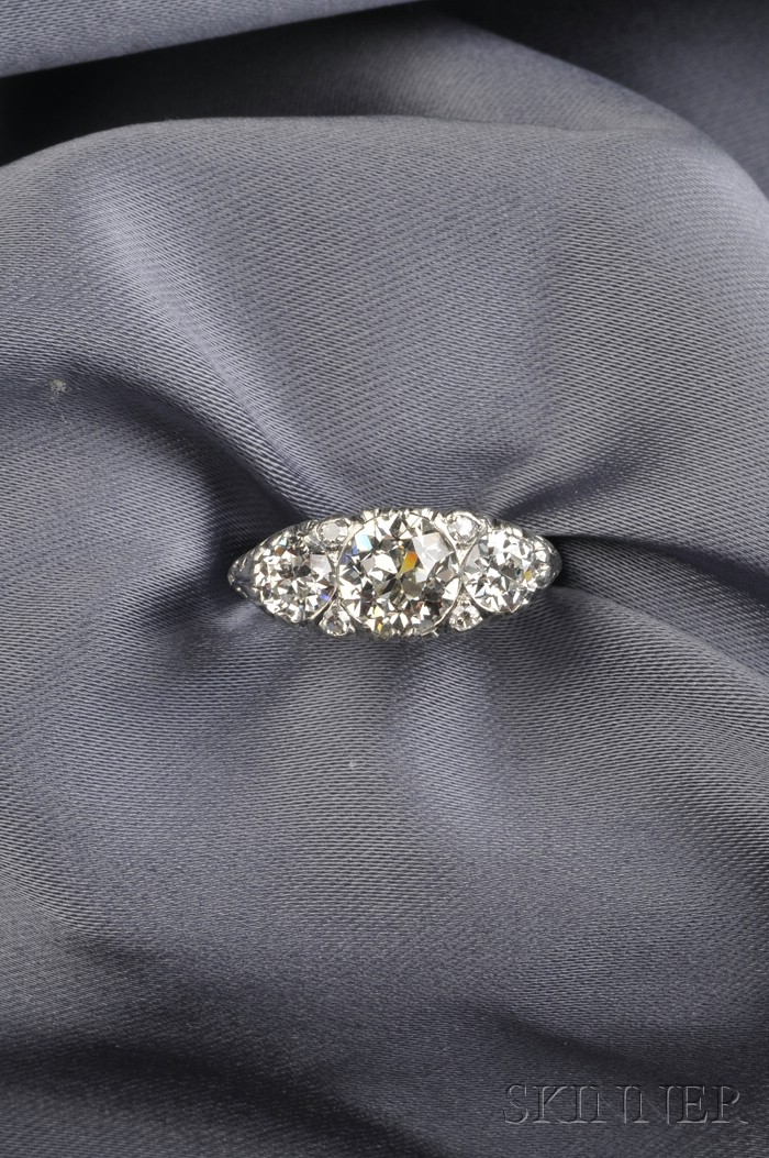 Appraisal: Art Deco Platinum and Three-stone Diamond Ring centering an old