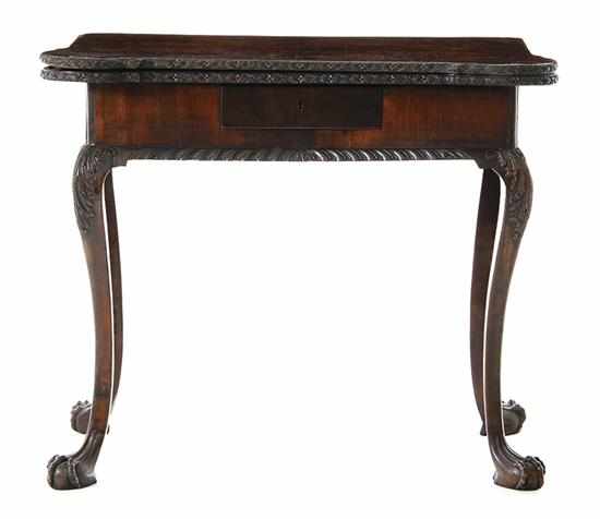 Appraisal: George III carved mahogany card table Irish late th early