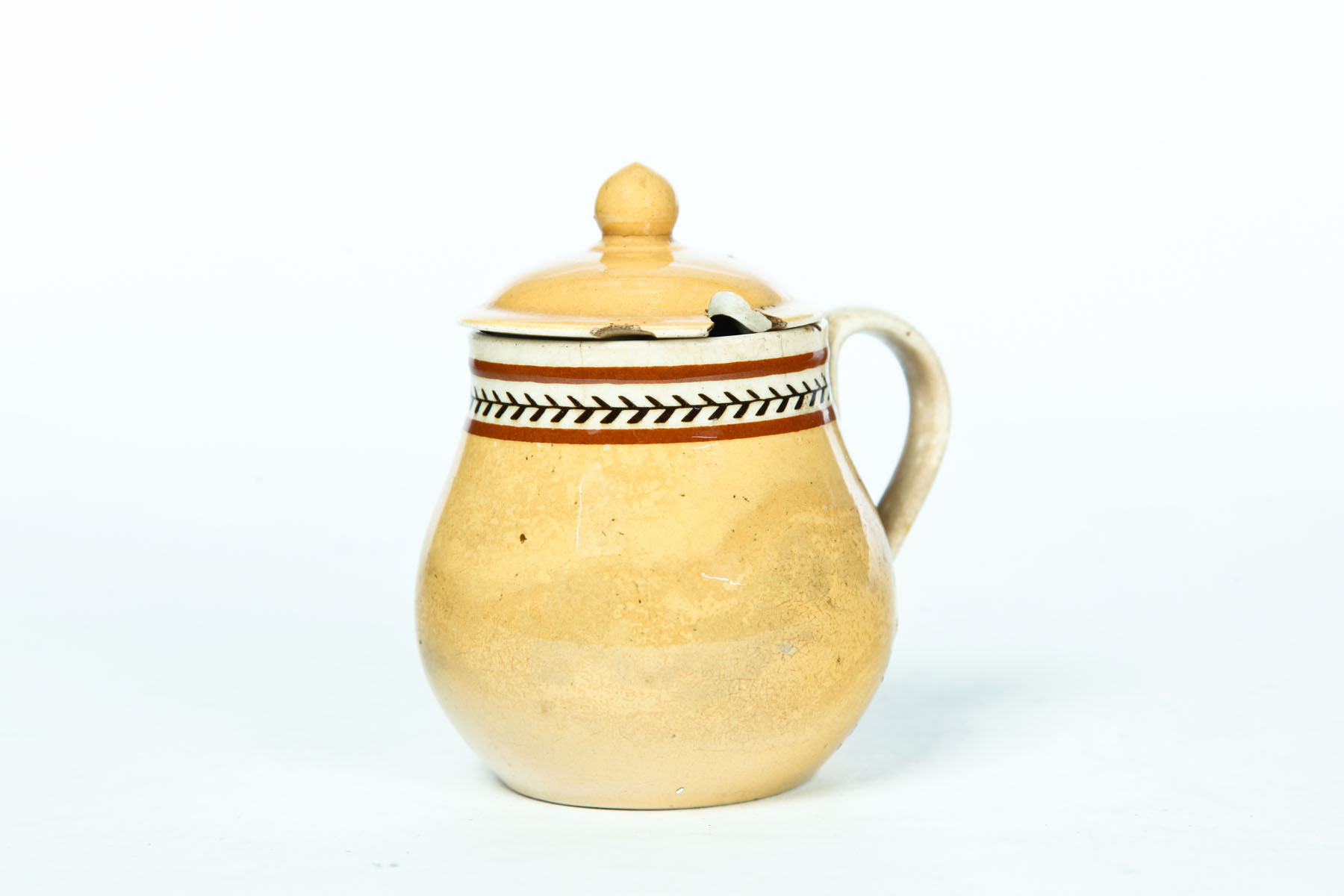 Appraisal: MOCHA MUSTARD POT England late th century Mustard color with