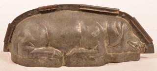 Appraisal: Antique Tin Reclining Pig Form Chocolate Mold - l Good