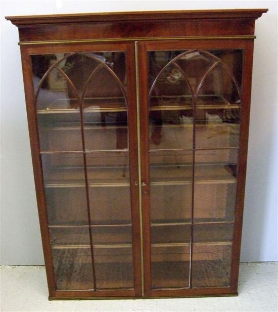 Appraisal: th century mahogany and brass strung bookcase top with two