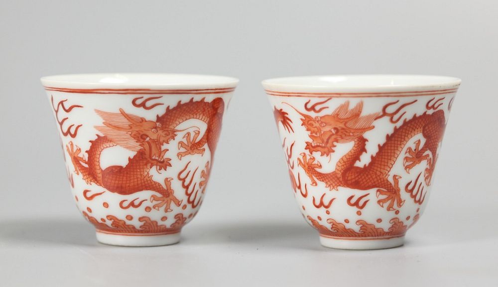 Appraisal: pair of Chinese porcelain cups decorated with iron red dragon