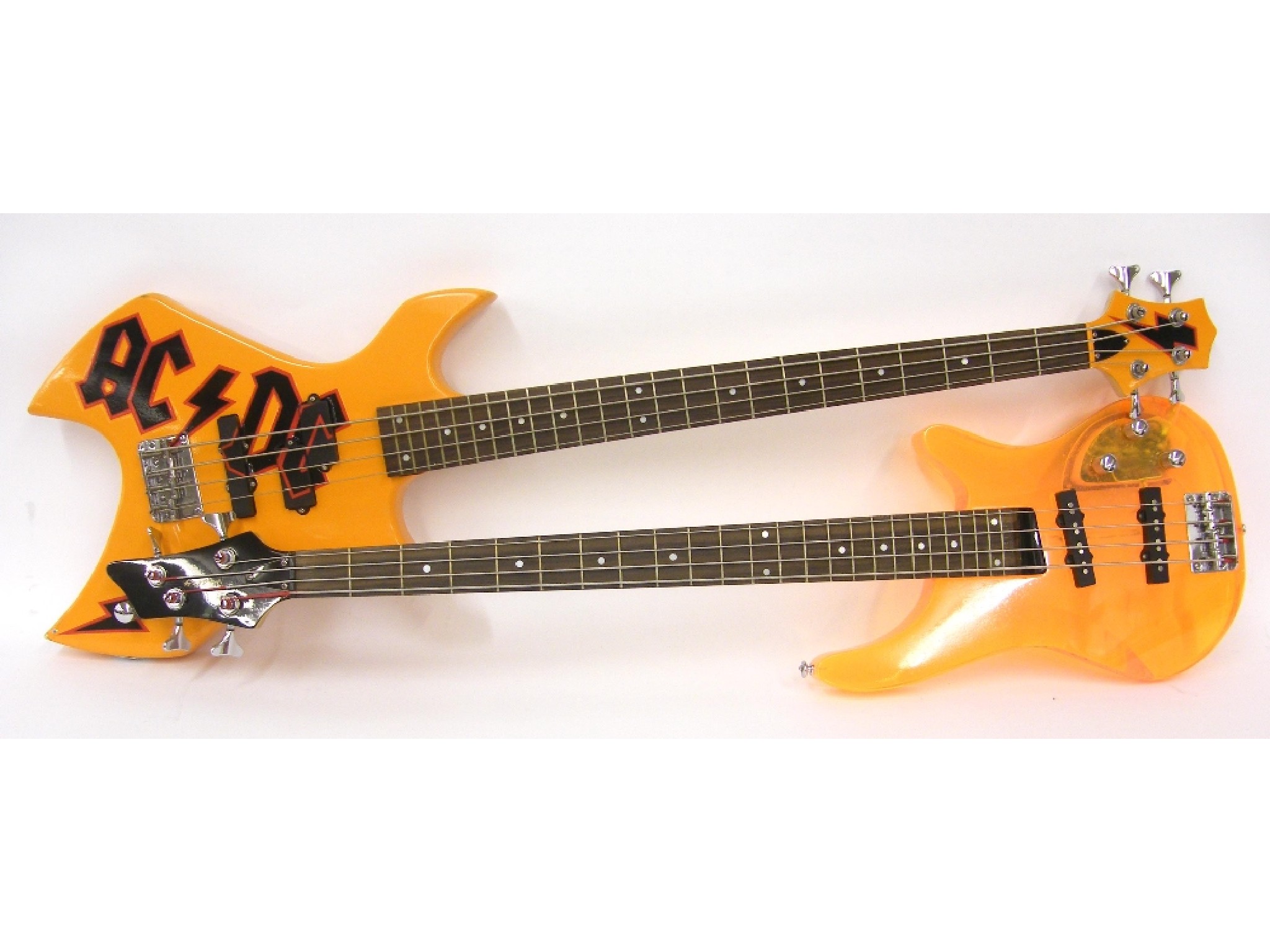 Appraisal: Wesley orange Perspex bass guitar the Perspex with some clouding