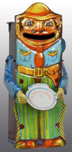 Appraisal: Tin Cowboy with Tray Mechanical Bank Description Rare tin bank