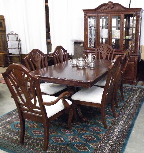 Appraisal: EIGHT-PIECE CHIPPENDALE STYLE MAHOGANY DINING SET comprising rectangular extension dining