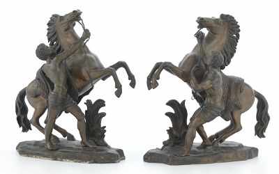 Appraisal: A Pair of Bronze Figurals after Coustou's Marly House Modeled