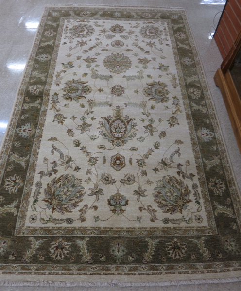 Appraisal: HAND KNOTTED ORIENTAL CARPET Indo-Persian floral and floral arabesque decoration