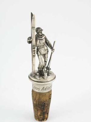 Appraisal: Skiing A German electroplated mounted bottle cork surmounted by the