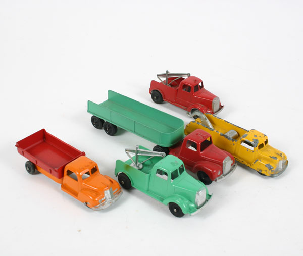 Appraisal: Tootsie Toy trucks three wreckers tractor trailer and dump bed