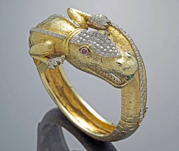 Appraisal: An diamond and ruby bracelet designed as an alligator estimated