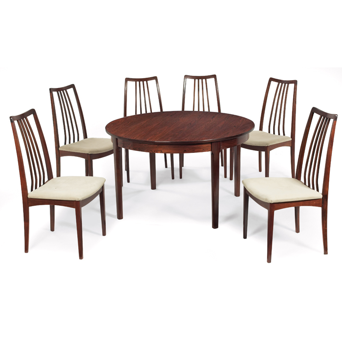 Appraisal: Koefoeds rosewood dining table and chairs Denmark round table with