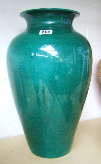 Appraisal: A pottery vase th century green glaze cm high