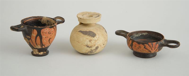 Appraisal: TWO APULIAN RED-OWL FIGURES A SMALL TWO-HANDLED VESSEL AND AN