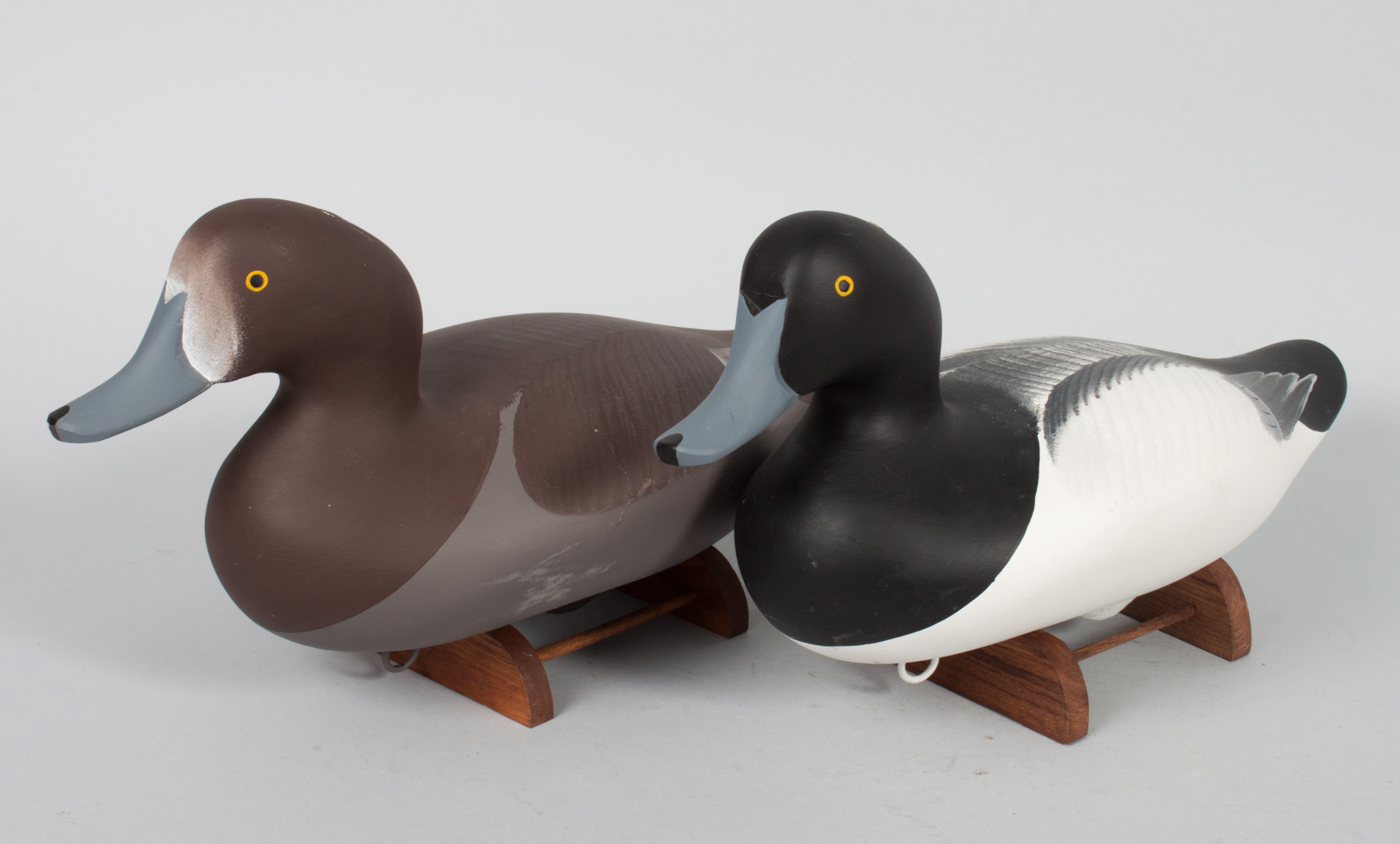 Appraisal: Pair of carved and polychromed wood duck decoys Blue Bill