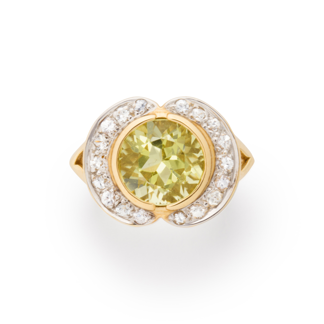 Appraisal: A CITRINE WHITE SAPPHIRE AND FOURTEEN KARAT BI-COLOR GOLD RING