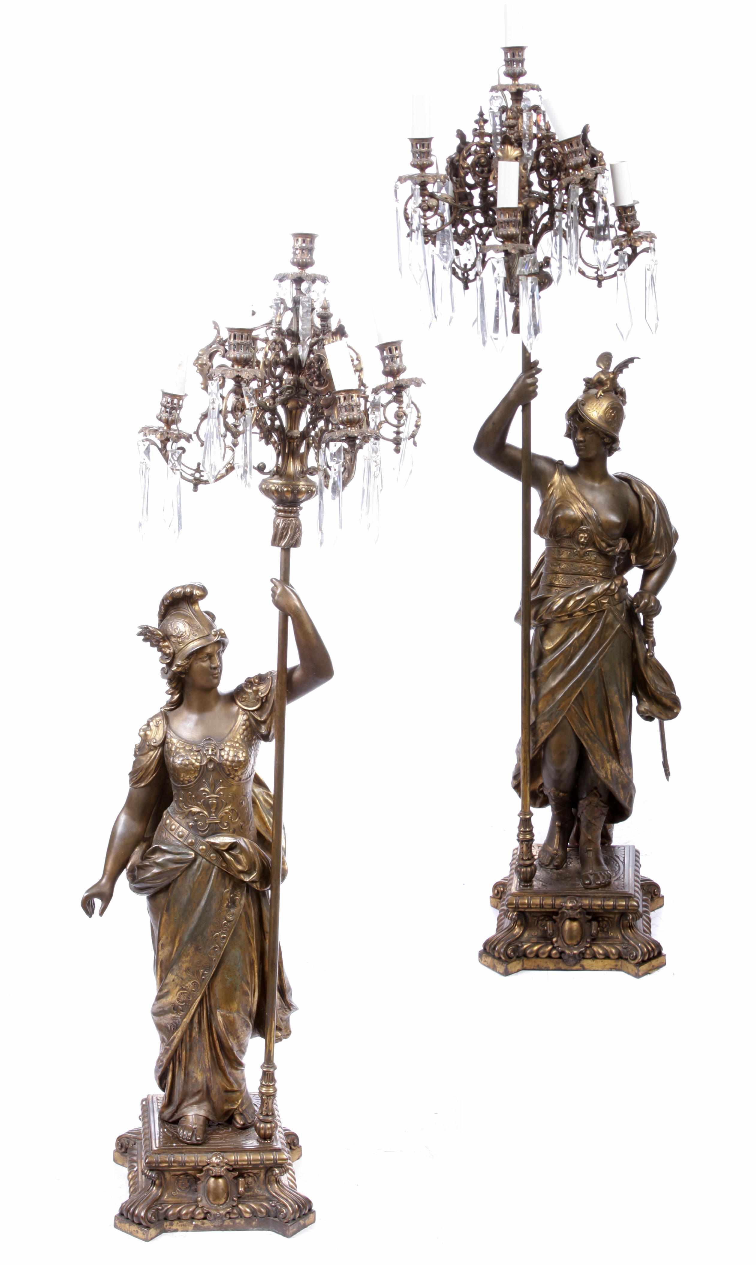 Appraisal: A pair of Empire style gilt metal and glass figural