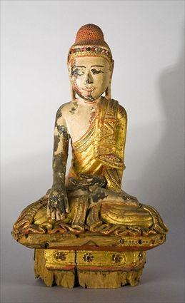 Appraisal: THAI CARVED PAINTED AND GILTWOOD FIGURE OF BUDDHA Seated with