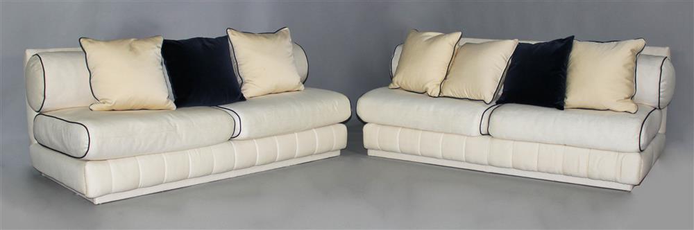 Appraisal: JUAN MONTOYA PAIR OF TWO MODERN BANQUETTE SOFAS CREAM WITH