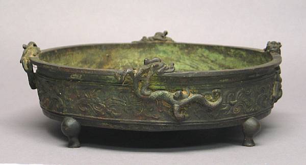 Appraisal: A cast bronze circular basin Late Qing Dynasty With five