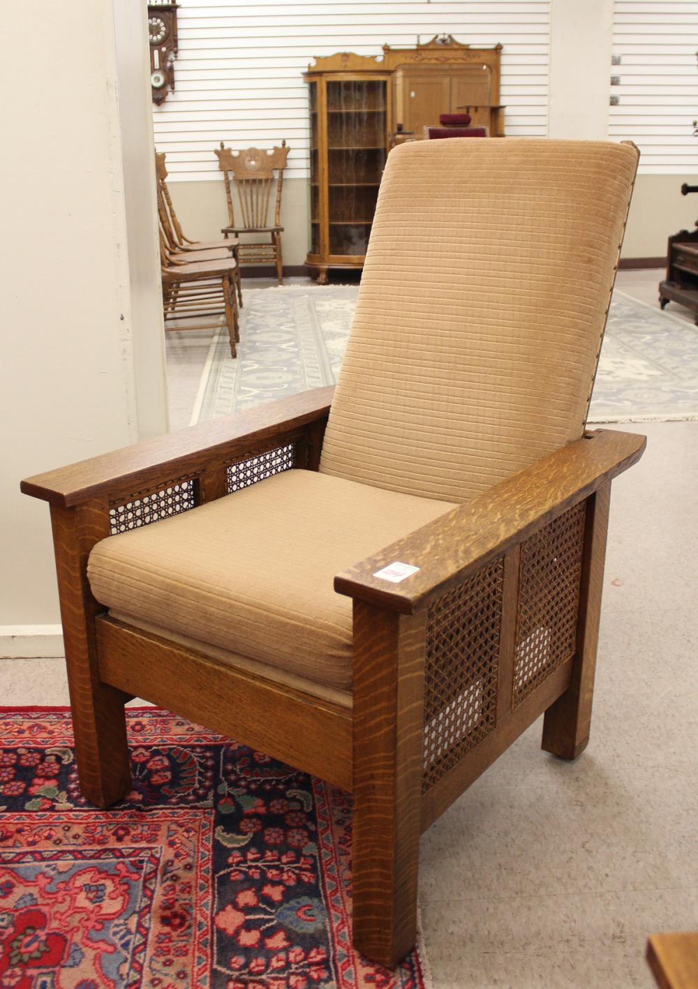 Appraisal: CRAFTSMAN OAK 'MORRIS' ARMCHAIR American c having an adjustable back